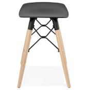 Tabouret bas scandinave 'Solo' noir avec 4 pieds en bois naturel