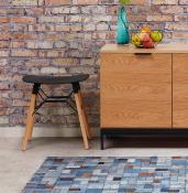 Tabouret bas scandinave 'Solo' noir avec 4 pieds en bois naturel