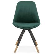 Chaise design 'Modena' en velours vert avec 4 pieds en bois noir et métal brossé doré